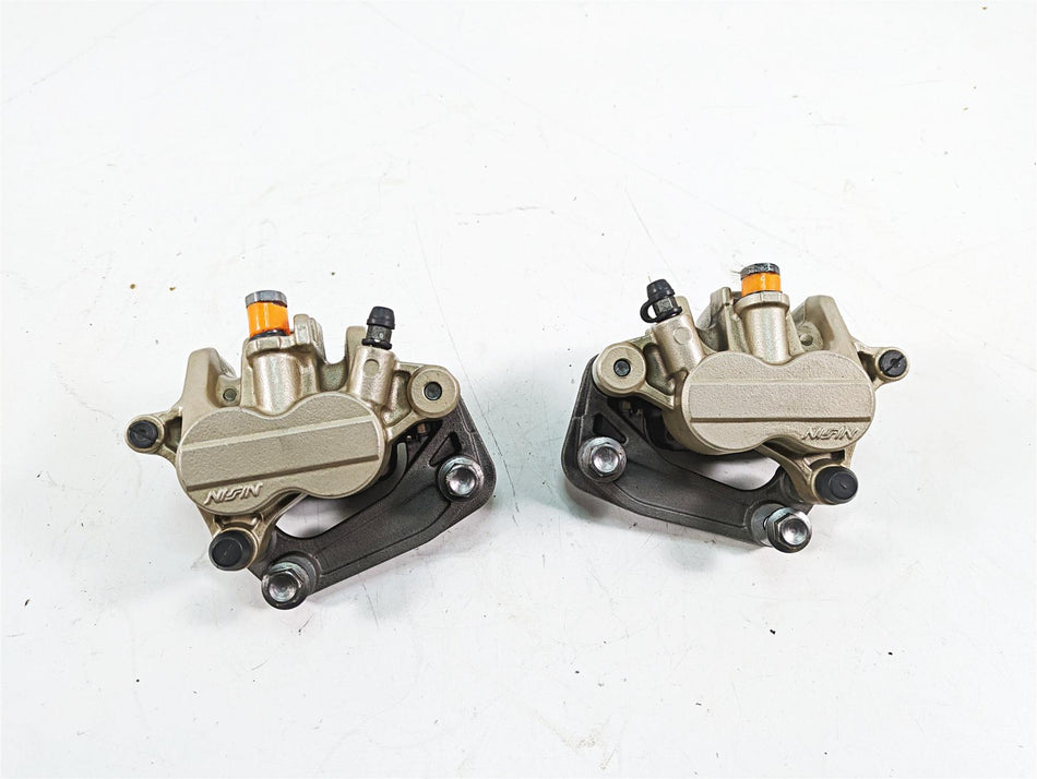 2012 Triumph Tiger 800XC ABS Nissin Front Brake Caliper Set T2022030 T2022031 {{ shop.shopifyCountryName }} - Mototech271