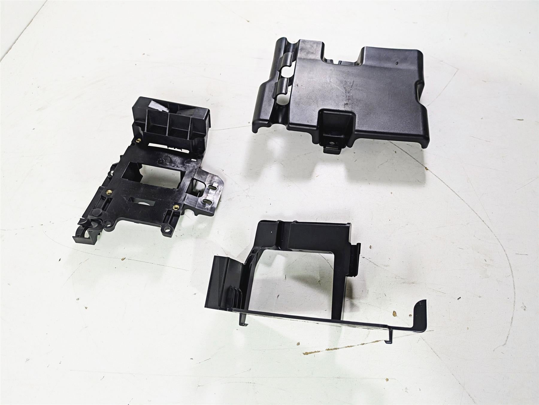 2009 Harley FXCWC Softail Rocker Electrical Carrier Holder Stay Set 70387-08 {{ shop.shopifyCountryName }} - Mototech271