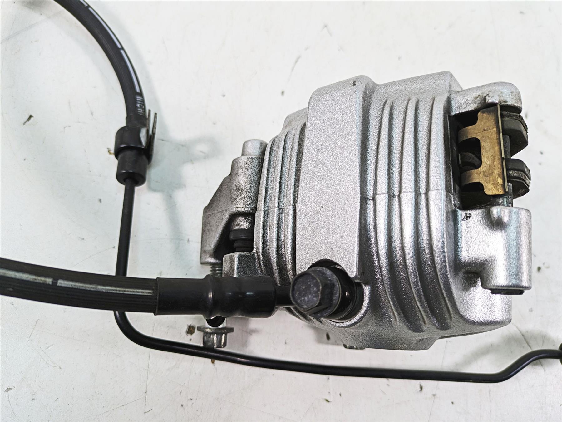 2007 Harley Sportster XL1200 C Front Brake Caliper + Line 44121-07A {{ shop.shopifyCountryName }} - Mototech271