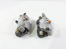 Load image into Gallery viewer, 2018 Can Am Maverick X3 XRC Turbo R Front Brake Caliper Set 705601462 705601463
