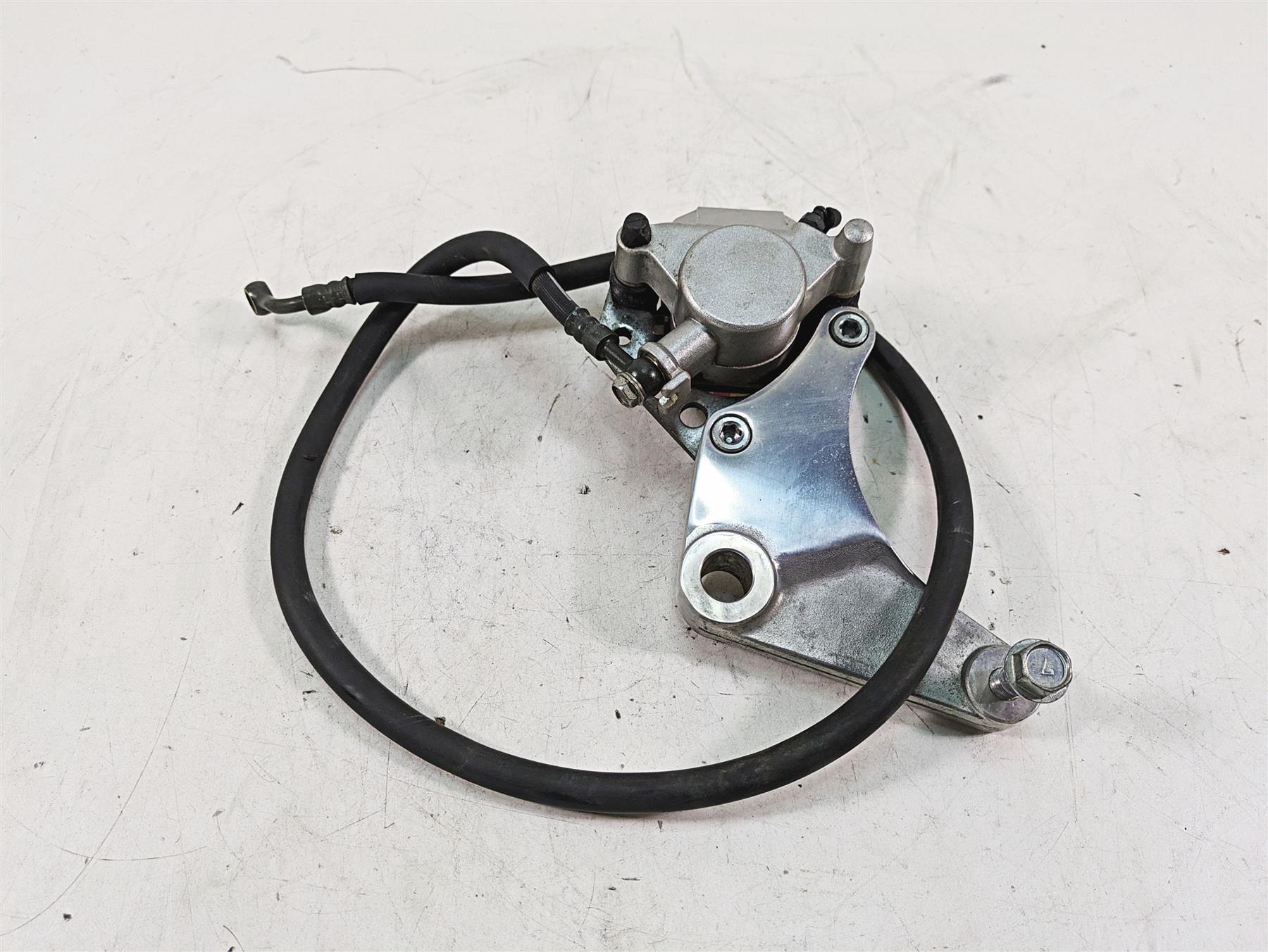 1997 Kawasaki VN1500 Vulcan Tokico Rear Brake Caliper & Bracket 43041-1588-GN | Mototech271
