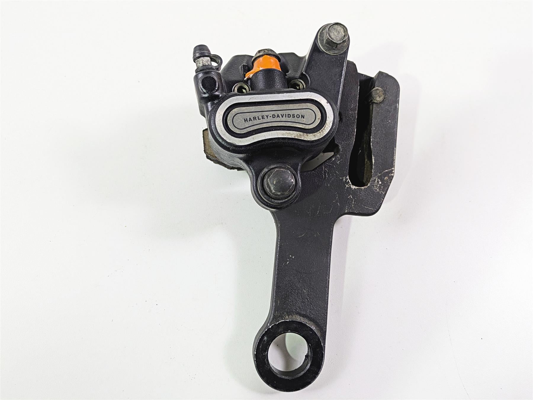 2018 Harley FLHCS Softail Heritage 115th Rear Brake Caliper & Bracket 41300192