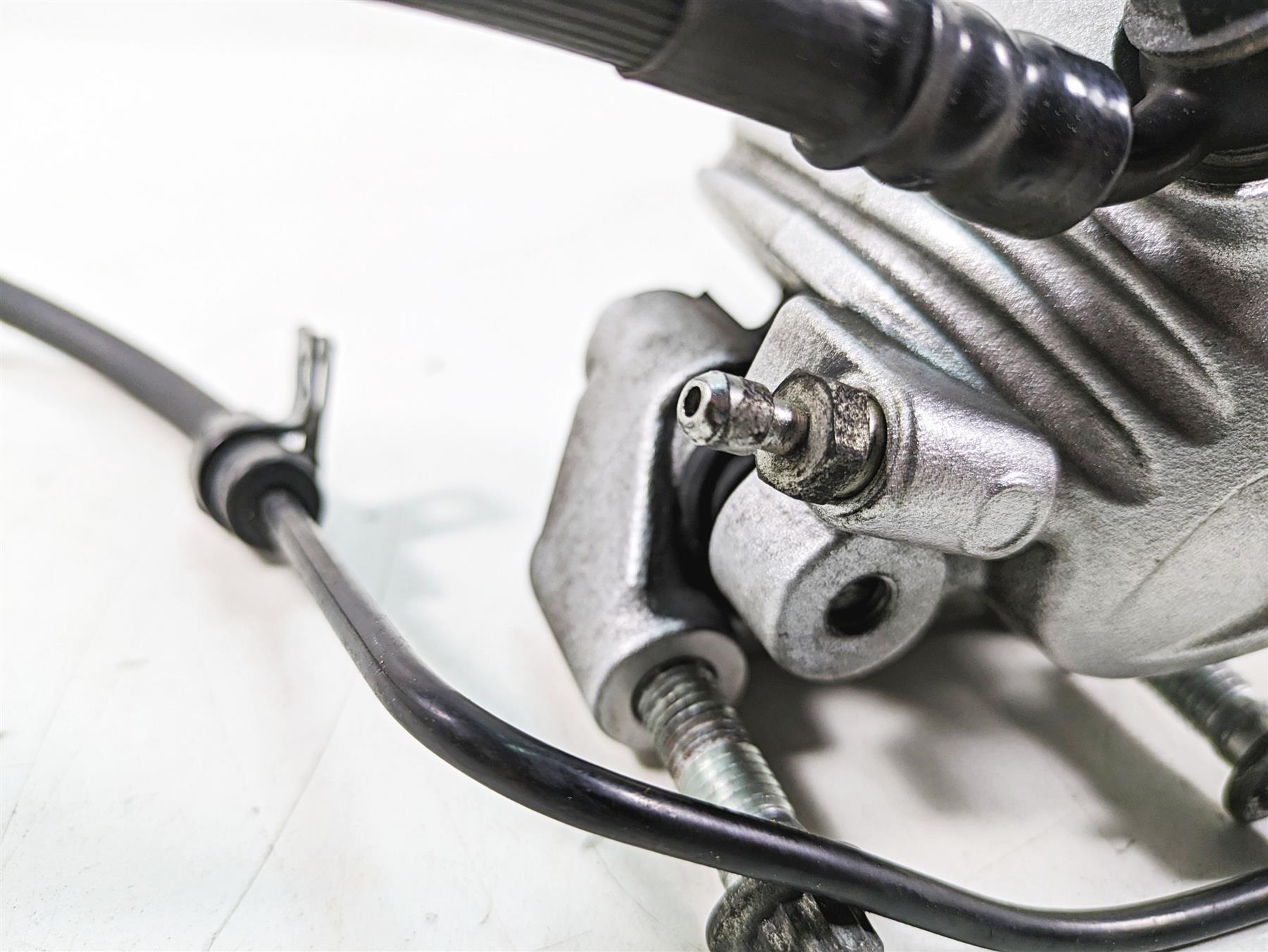 2007 Harley Sportster XL1200 C Front Brake Caliper + Line 44121-07A {{ shop.shopifyCountryName }} - Mototech271