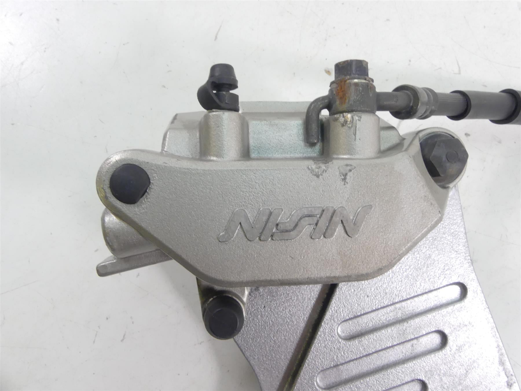 2008 Honda V-Twin VTX1800 N3 Rear Nissin Brake Caliper & Bracket 43150-MCV-R11 {{ shop.shopifyCountryName }} - Mototech271