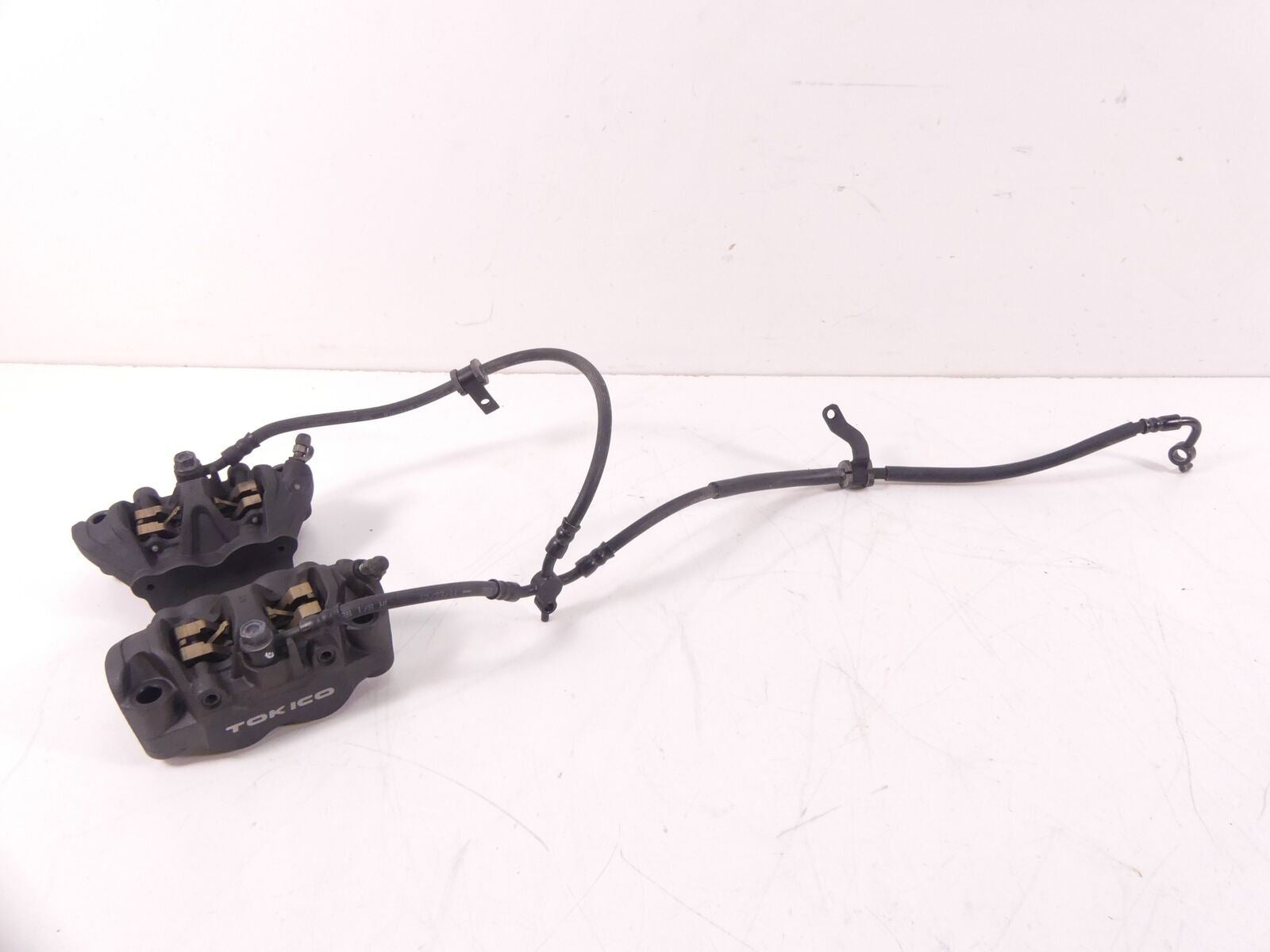 2012 Honda CBR600RR Front Tokico Brake Caliper Set 45150-MFL-881 45250-MFL-881 {{ shop.shopifyCountryName }} - Mototech271