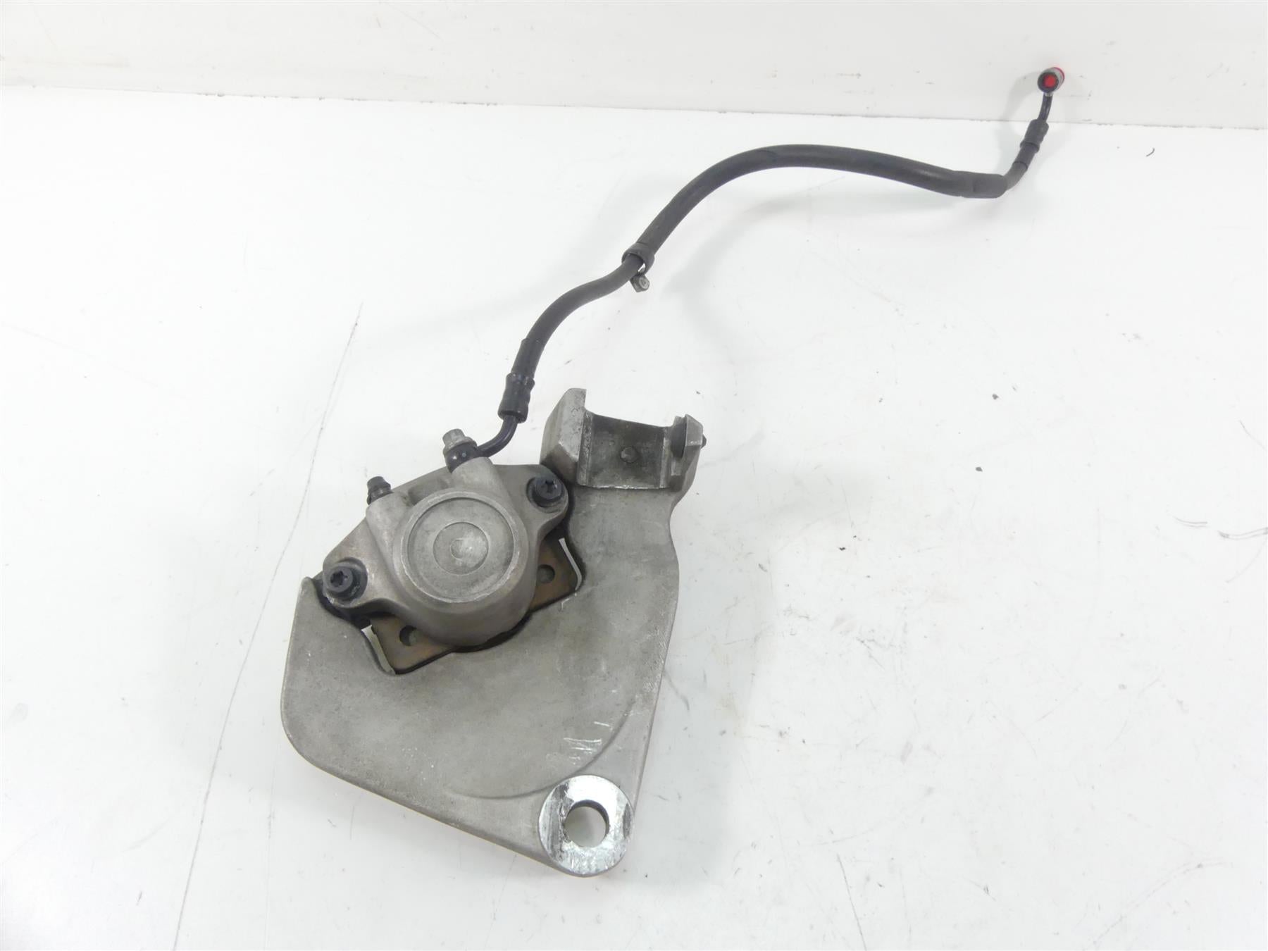 1989 Harley Touring FLTC Tour Glide Rear Brake Caliper & Bracket Mount 44050-87
