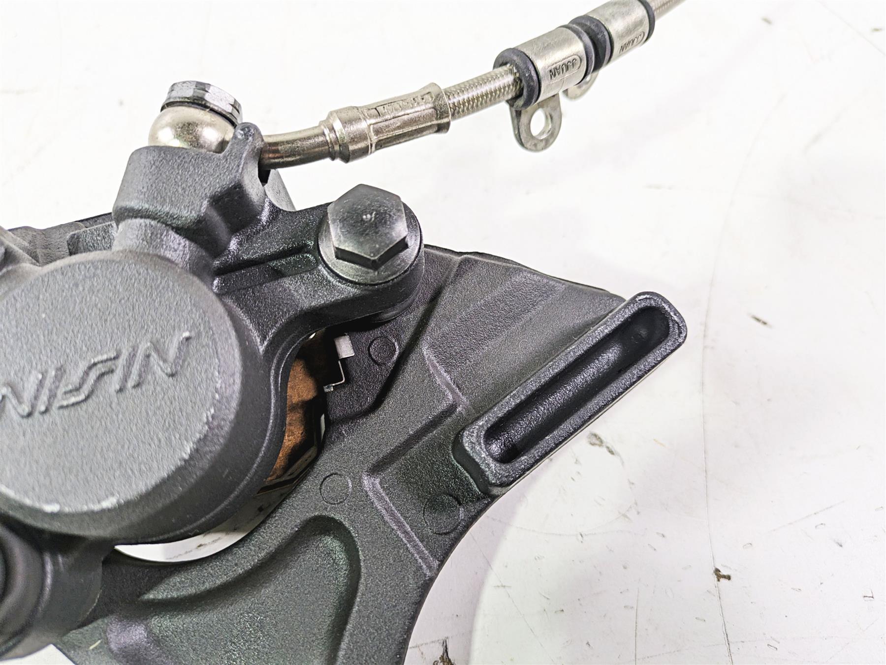 2012 Triumph Daytona 675 Nissin Rear Caliper + Line & Bracket T2021410 {{ shop.shopifyCountryName }} - Mototech271