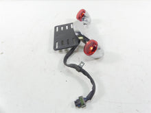 Load image into Gallery viewer, 2013 Harley Touring FLHX Street Glide Rear Turn Signal Plate Holder Set 73314-10 | Mototech271
