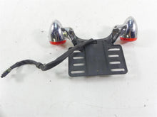 Load image into Gallery viewer, 2013 Harley Touring FLHX Street Glide Rear Turn Signal Plate Holder Set 73314-10 | Mototech271
