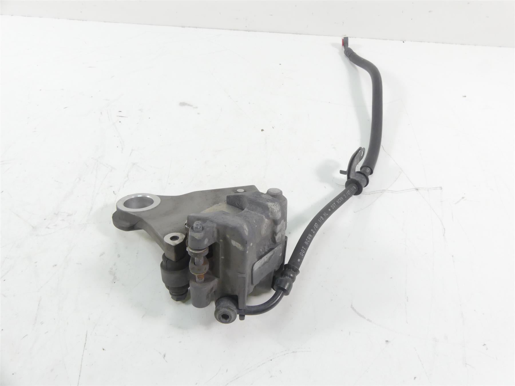 2007 Yamaha FZ1 Fazer Rear Nissin Brake Caliper & Bracket 2D1-2580W-00-00 {{ shop.shopifyCountryName }} - Mototech271