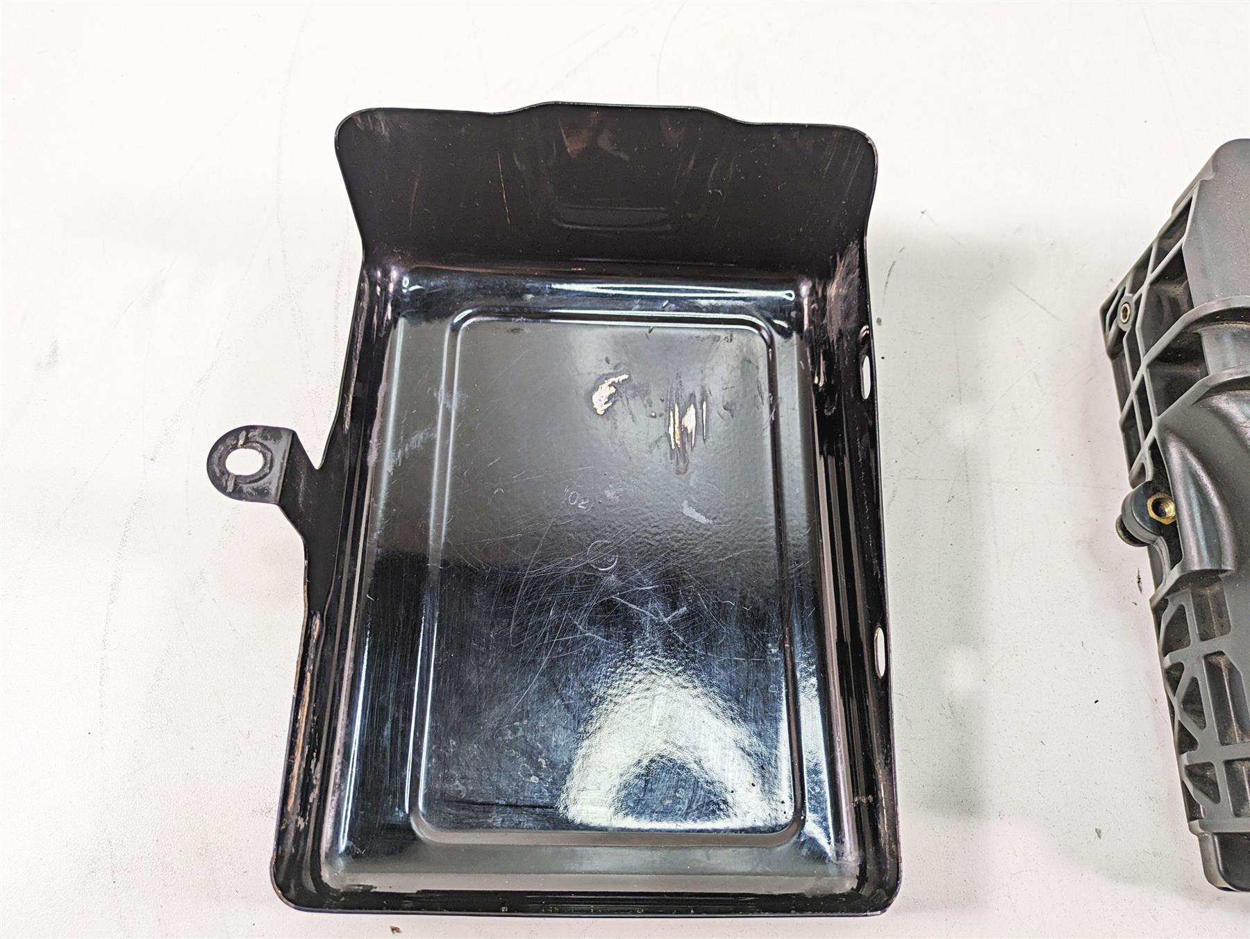 2012 Harley FLD Dyna Switchback Battery Tray Carrier Stay & Cover 70379-06B {{ shop.shopifyCountryName }} - Mototech271