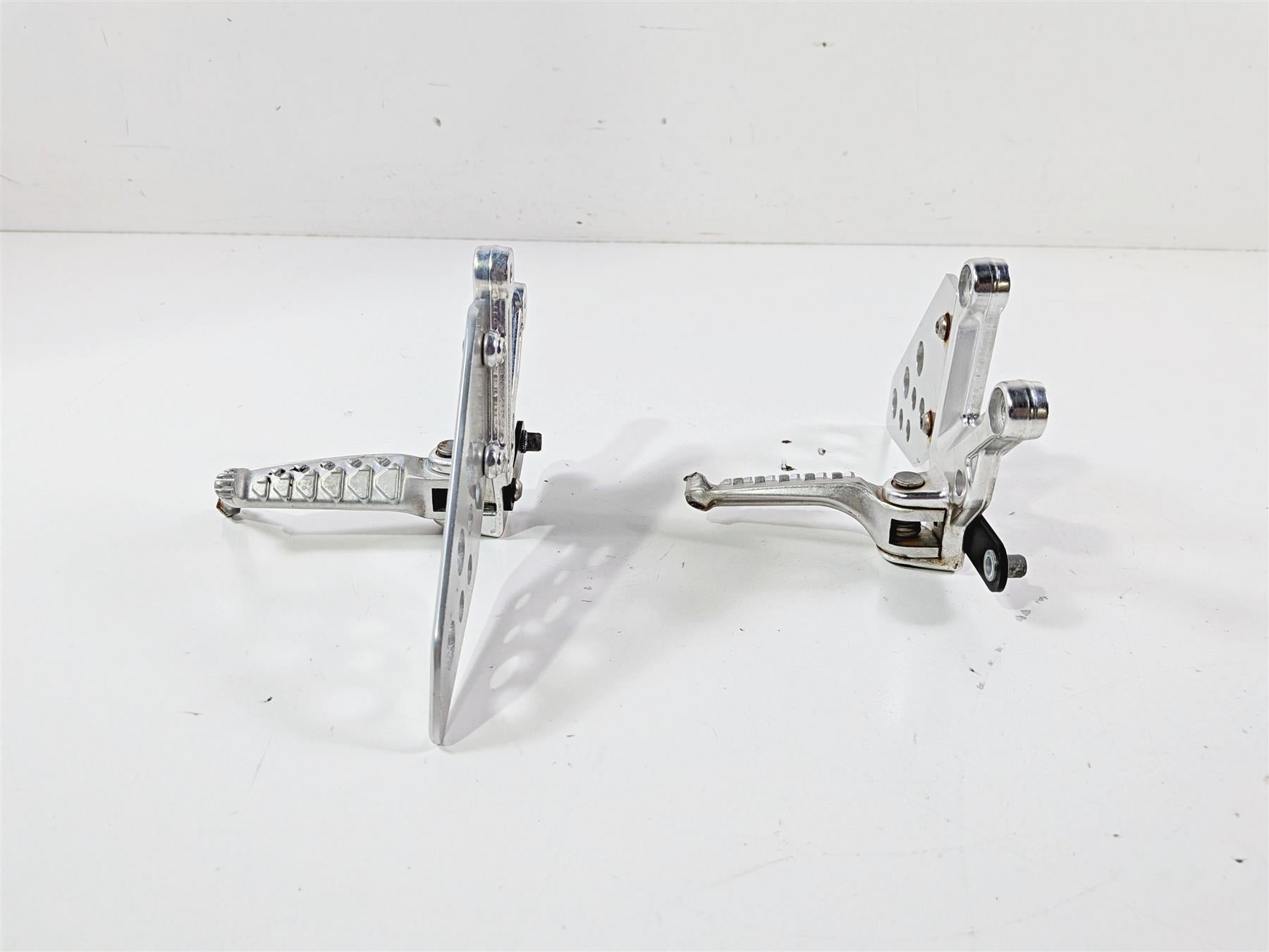 2008 Aprilia RSVR 1000 Factory Front Left & Right Foot Pegs AP8154069 AP8154070 {{ shop.shopifyCountryName }} - Mototech271