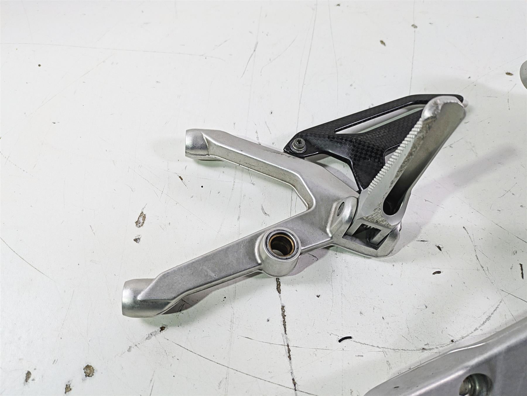 2015 Ducati Panigale 1299 S Left Footpeg & Frame Holder 8291E061AA 82424631AA {{ shop.shopifyCountryName }} - Mototech271