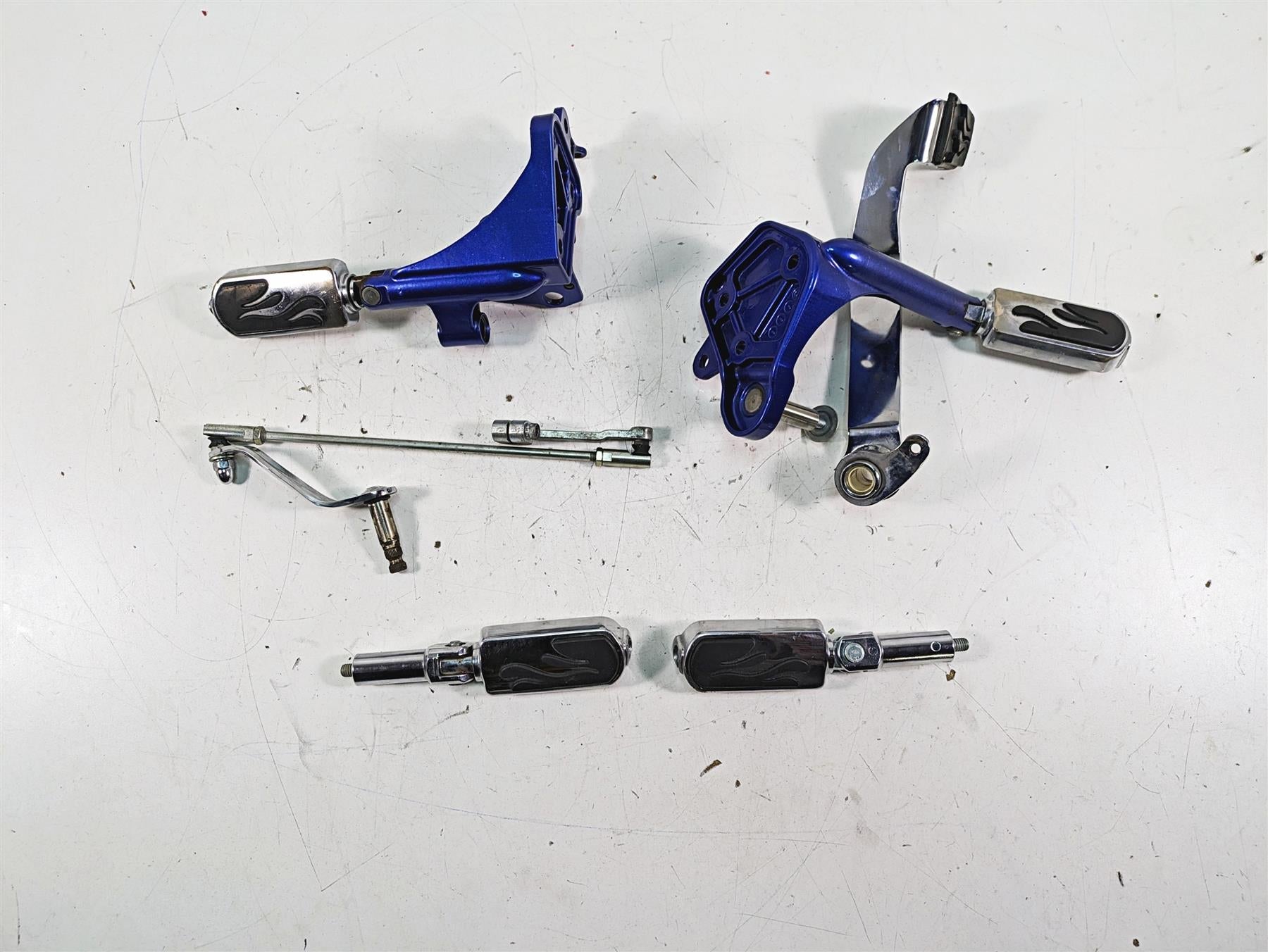 2009 Harley FXCWC Softail Rocker C Flame Foot Peg & Blue Brackets Set 33683-07A {{ shop.shopifyCountryName }} - Mototech271
