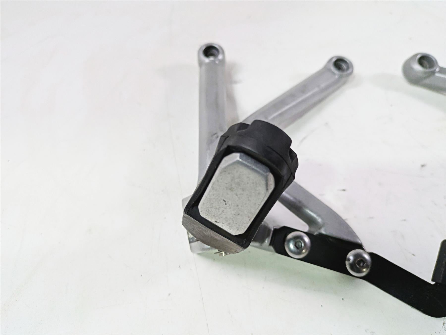 2013 Triumph Tiger 1215 Explorer Rear Passenger Footpeg Rest Set T2082162 {{ shop.shopifyCountryName }} - Mototech271