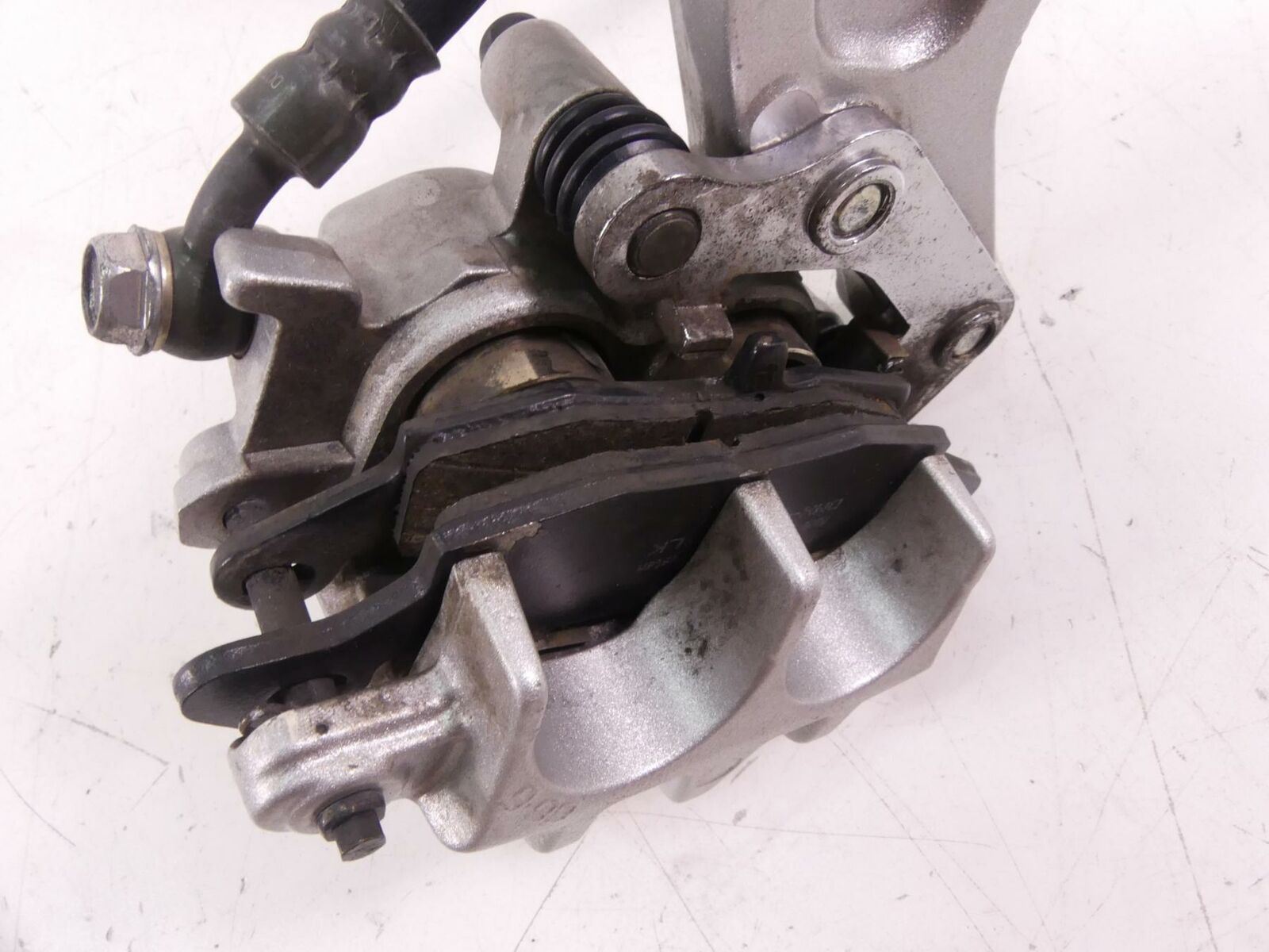 2001 Kawasaki VN1500 Vulcan C Rear Tokico Brake Caliper W/ Bracket 43041-1814-GN {{ shop.shopifyCountryName }} - Mototech271