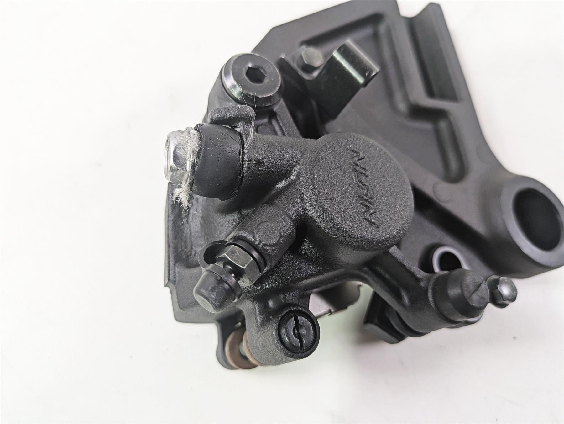 2024 Kawasaki ZX6R ZX636 Ninja Nissin Rear Brake Caliper & Bracket 43080-0242-DJ {{ shop.shopifyCountryName }} - Mototech271