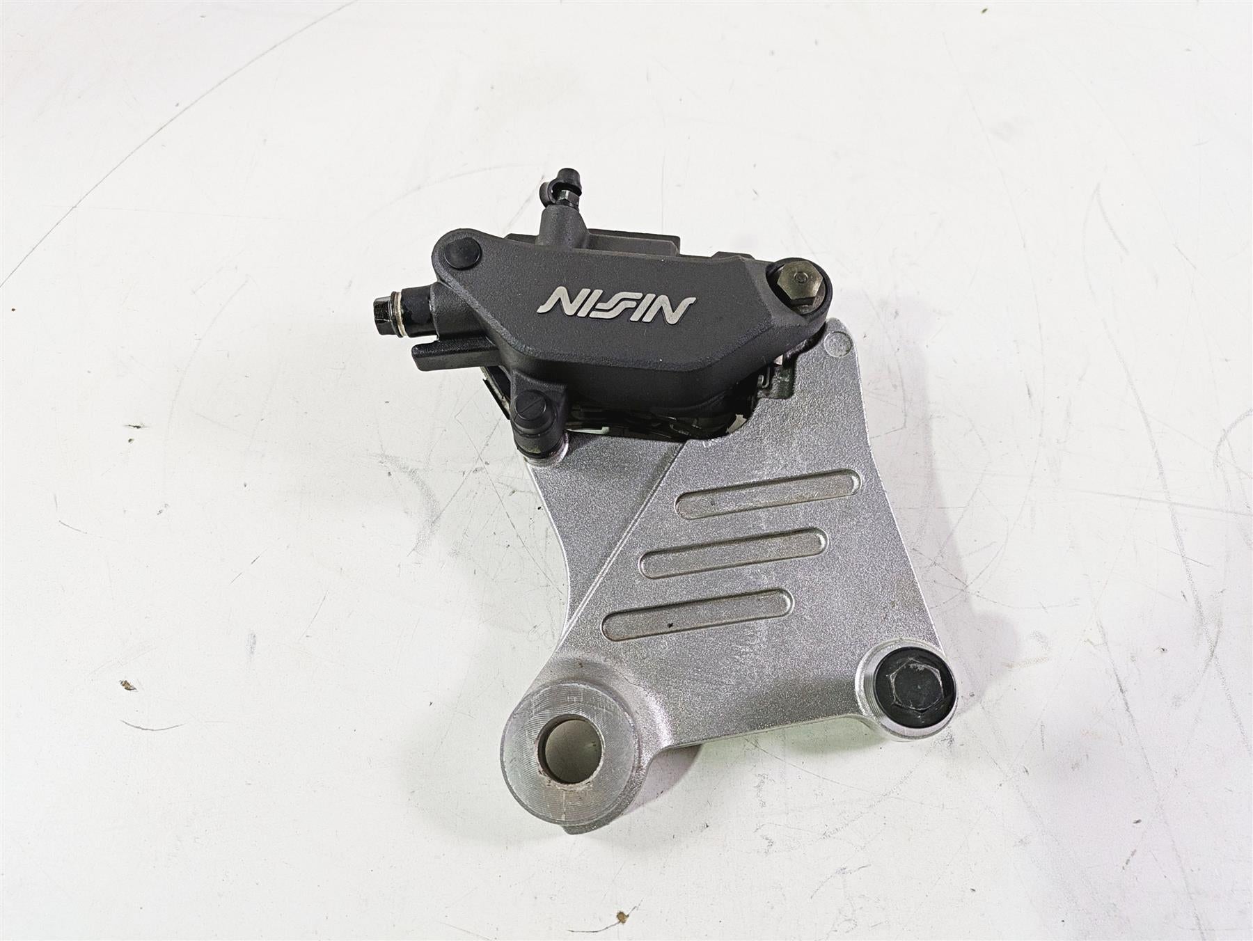 2002 Honda V-Twin VTX1800 C Rear Brake Caliper & Bracket Nissin 43150-MCH-006 {{ shop.shopifyCountryName }} - Mototech271