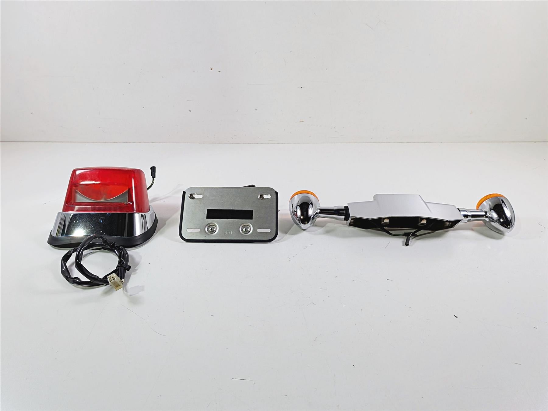 2006 Suzuki C90 VL1500T Boulevard Taillight Blinker Plate Holder Set 35710-10F30 {{ shop.shopifyCountryName }} - Mototech271