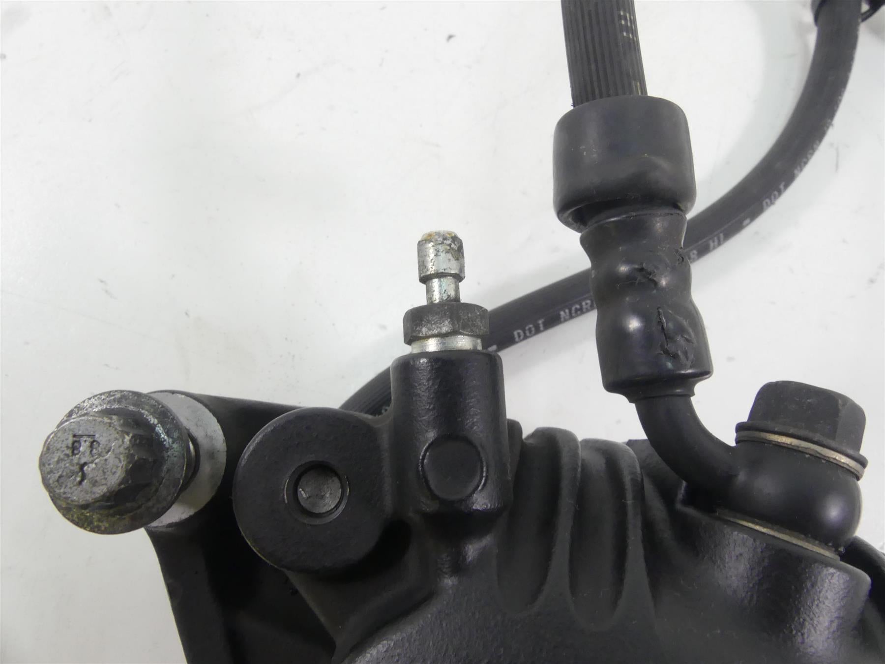 2007 Harley Sportster XL1200 Nightster Front Brake Caliper & Line 44121-07A {{ shop.shopifyCountryName }} - Mototech271