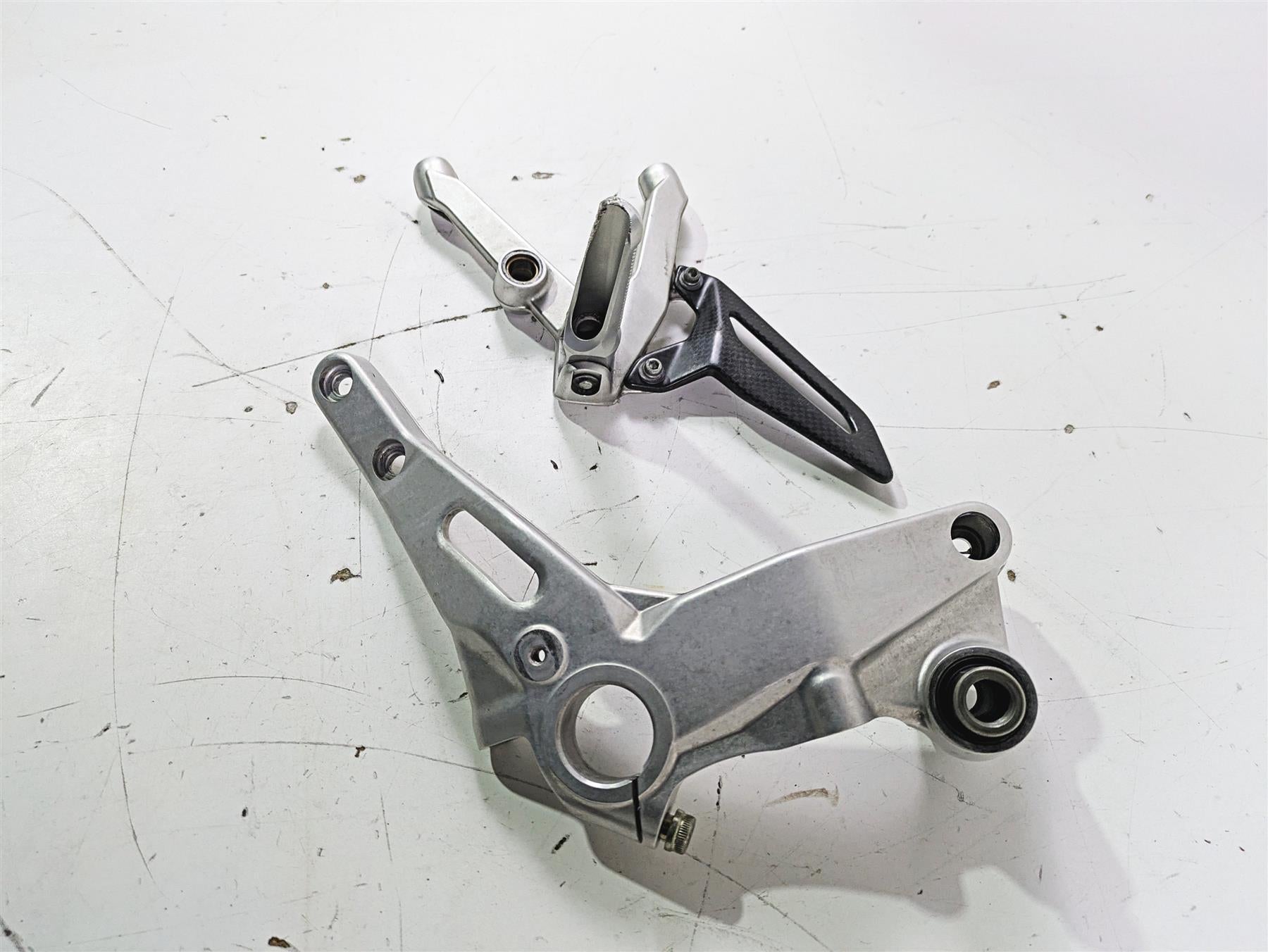 2015 Ducati Panigale 1299 S Left Footpeg & Frame Holder 8291E061AA 82424631AA {{ shop.shopifyCountryName }} - Mototech271