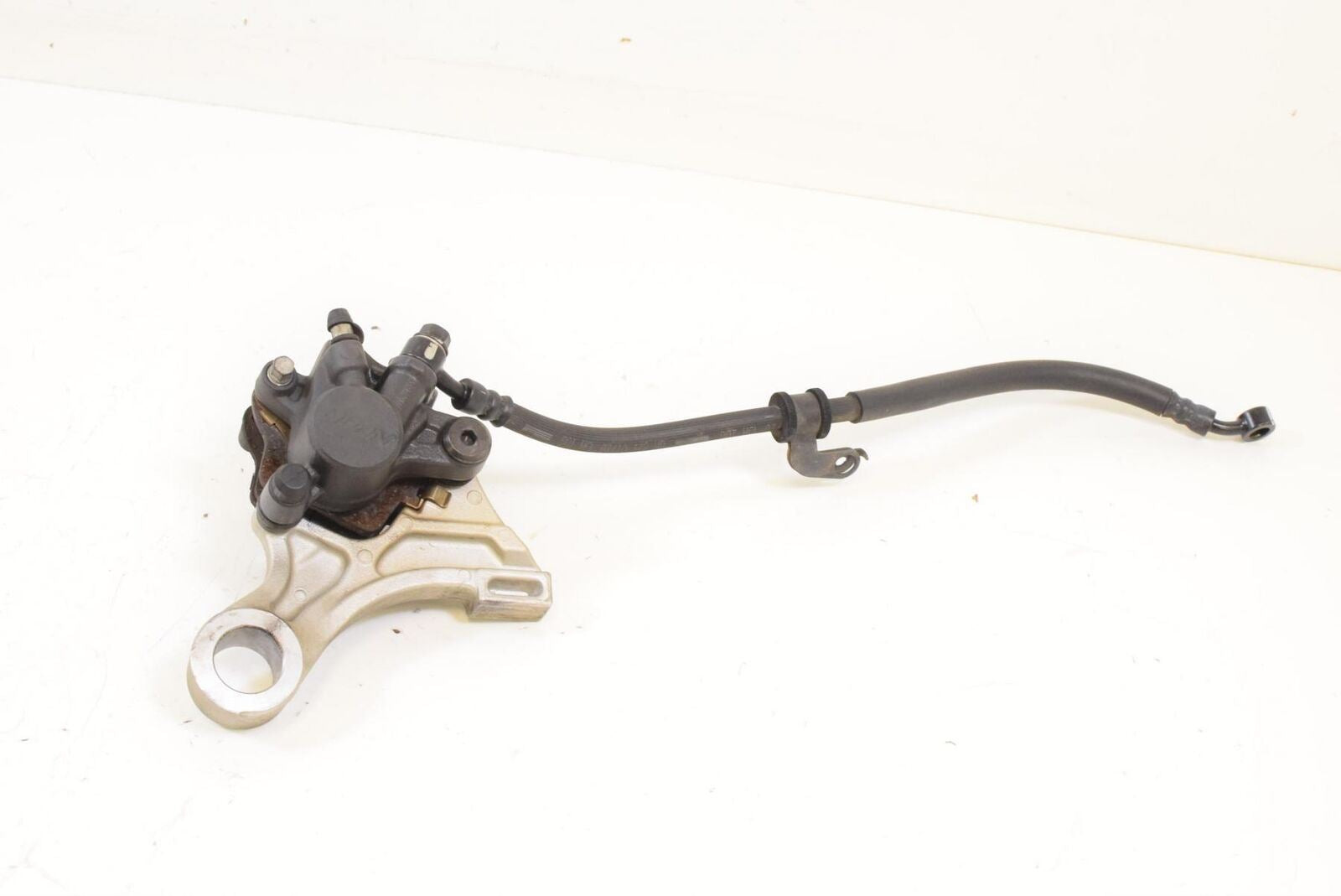2010 Honda CBR600RR CBR600 RR Rear Brake Caliper Pads Bracket Mount 43150-MFJ-D0 {{ shop.shopifyCountryName }} - Mototech271