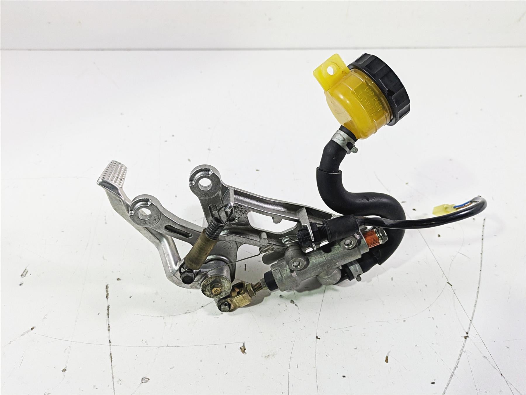 2005 Kawasaki ZX12R Ninja Right Footpeg & Brake Master Cylinder 35063-0069-458 {{ shop.shopifyCountryName }} - Mototech271
