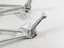 Load image into Gallery viewer, 2021 Aprilia RS660 Rear Passenger Footpeg Set - Rash 2B005206 2B005205
