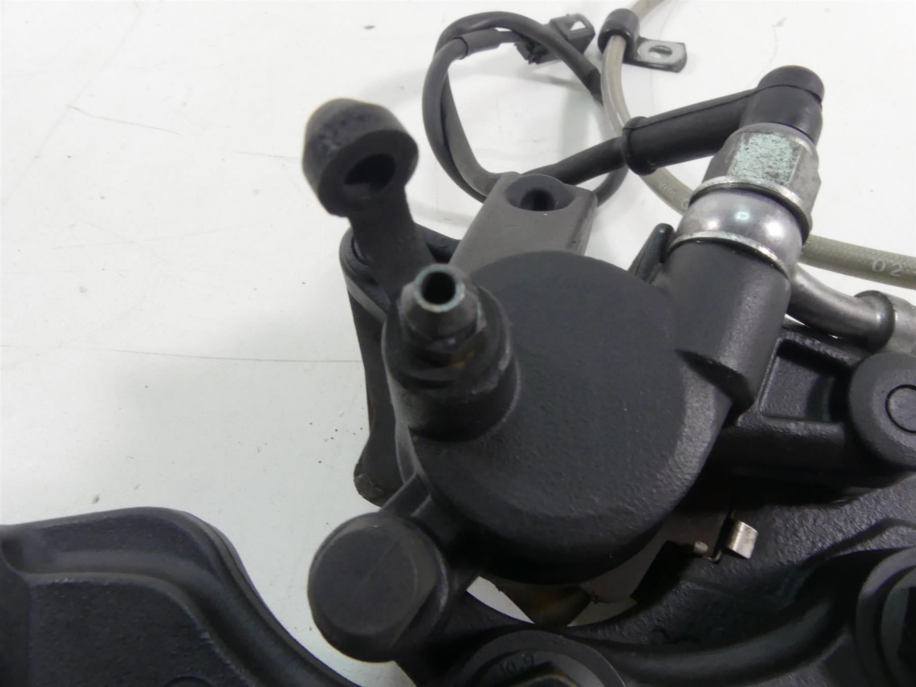 2017 Victory Octane 1200 Rear Brake Caliper + Line & Mount 1912701-468 {{ shop.shopifyCountryName }} - Mototech271