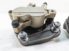 Load image into Gallery viewer, 2012 Triumph Tiger 800XC ABS Nissin Front Brake Caliper Set T2022030 T2022031
