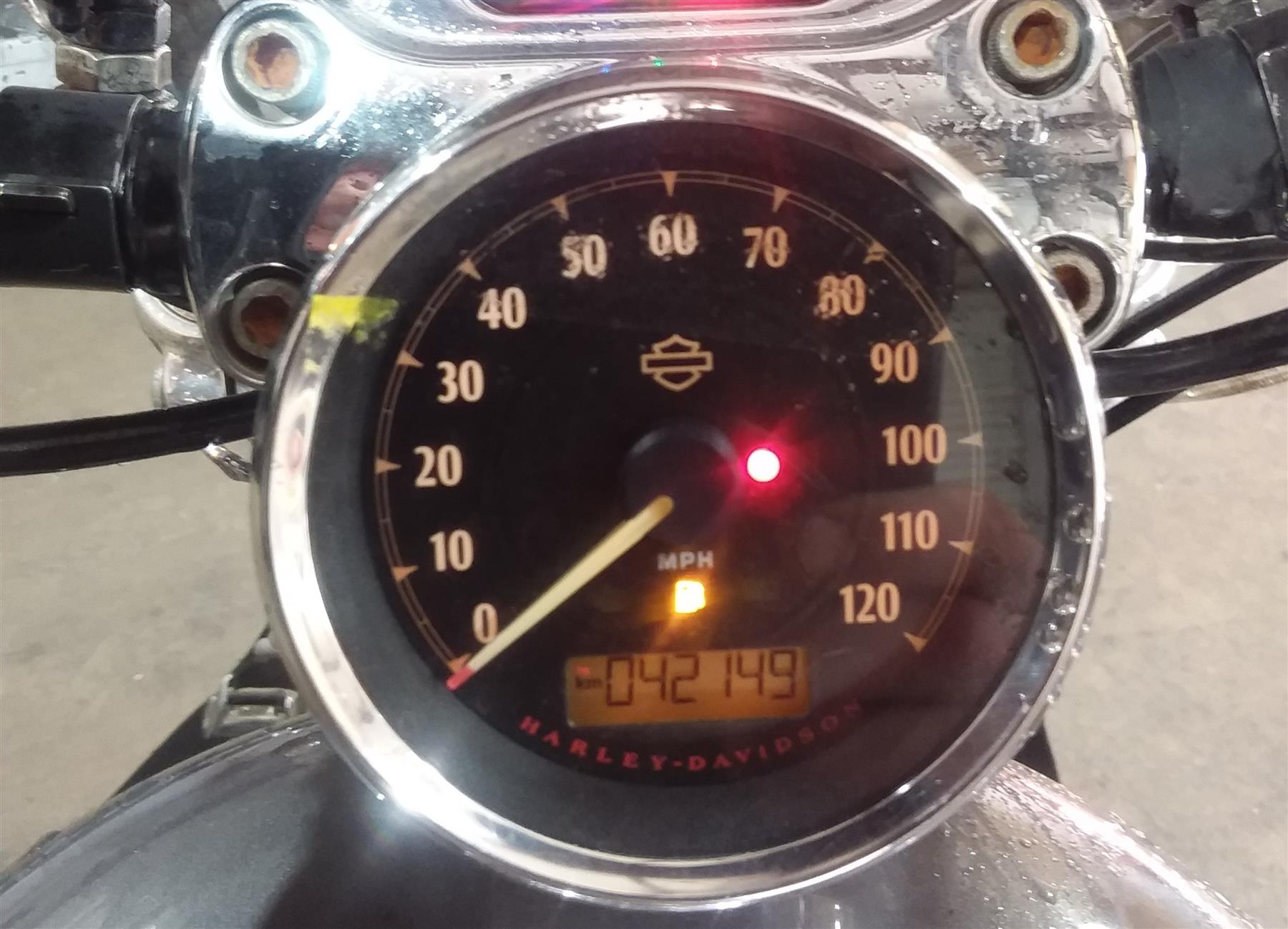 2014 Harley Sportster XL1200 C Speedometer 42K instrument Cluster 70900221 {{ shop.shopifyCountryName }} - Mototech271