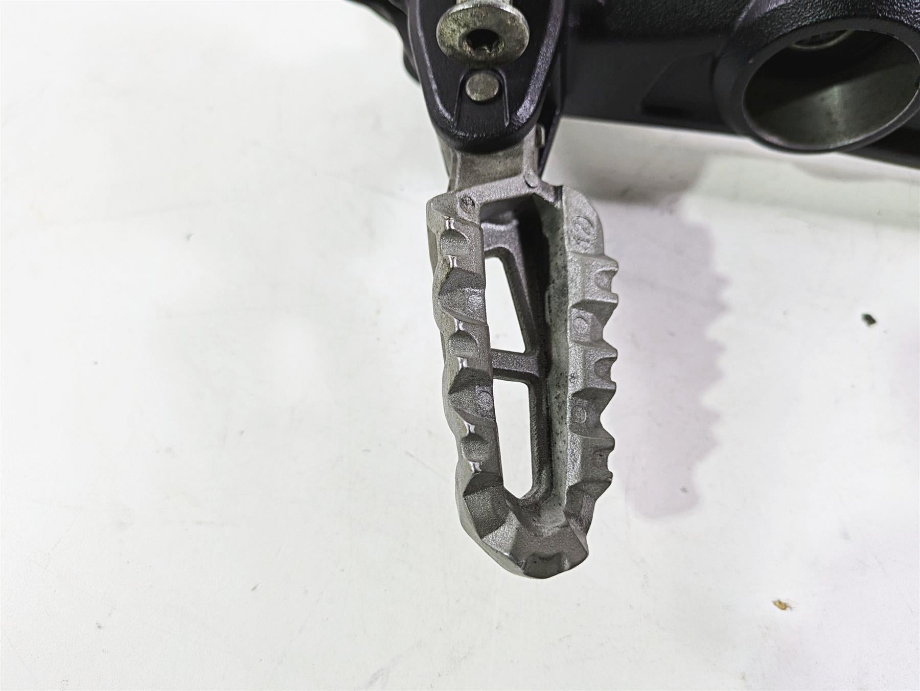 2013 Ducati Hyperstrada 821 Left Footpeg Bracket Mount Holder 82412111AA {{ shop.shopifyCountryName }} - Mototech271