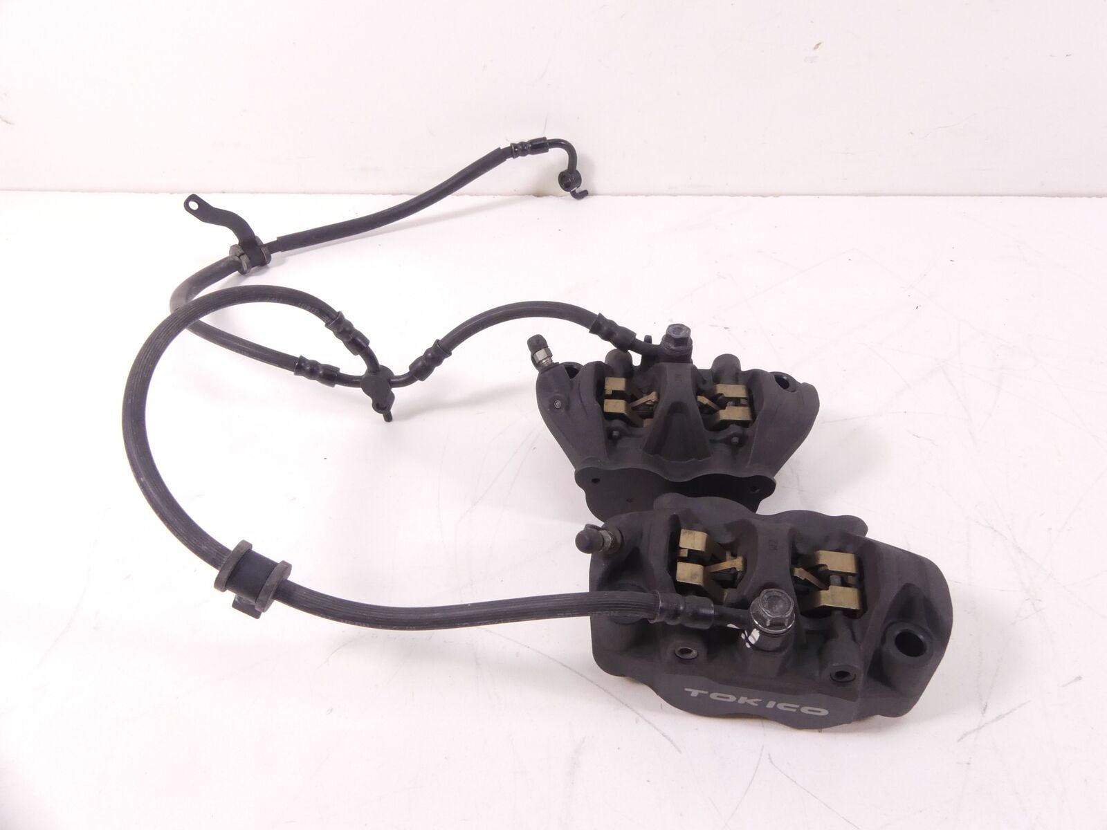 2012 Honda CBR600RR Front Tokico Brake Caliper Set 45150-MFL-881 45250-MFL-881 | Mototech271
