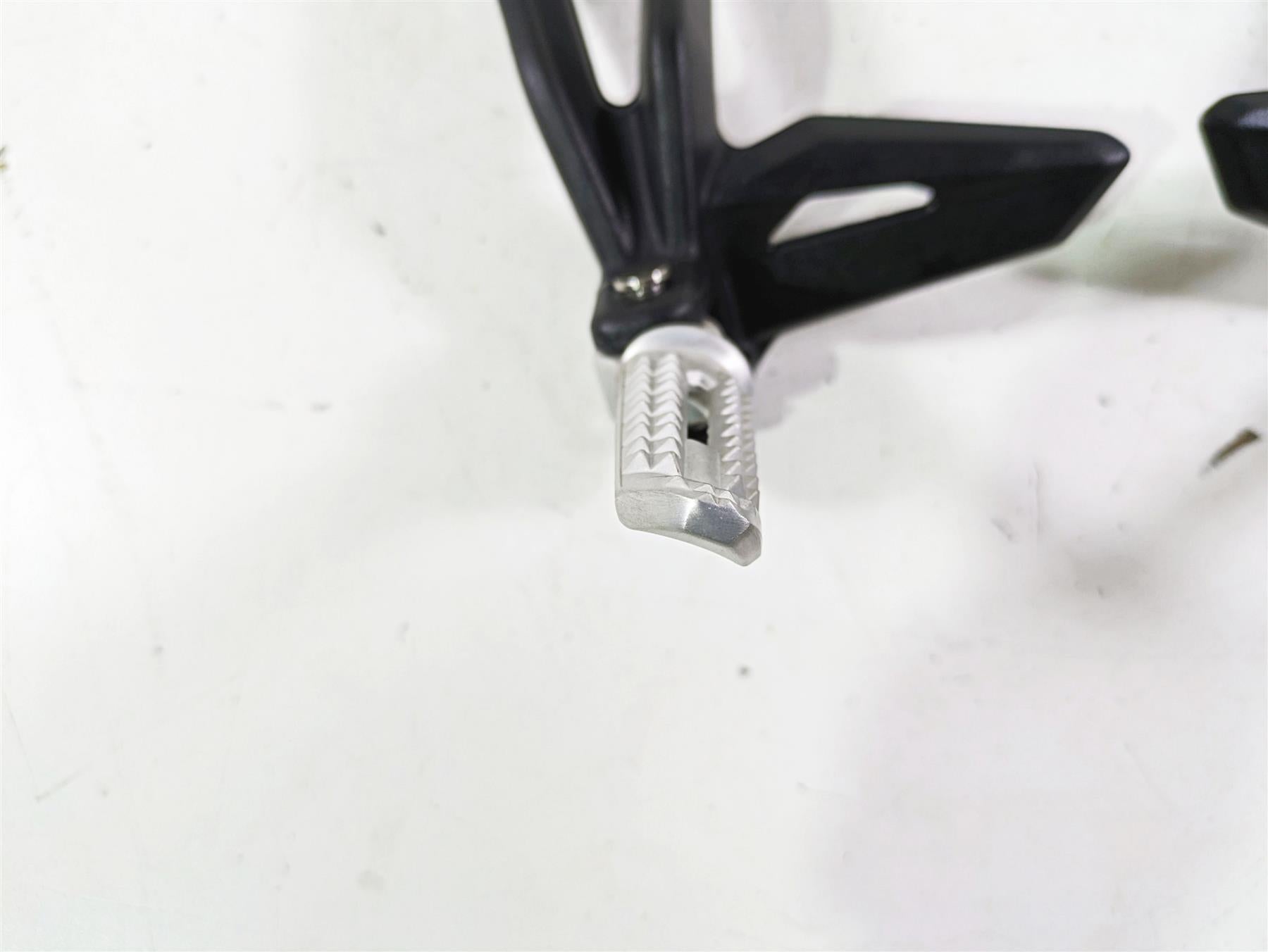 2023 Triumph Street Triple 765 RS Rear Passenger Footpeg Set T2088156 T2088157 {{ shop.shopifyCountryName }} - Mototech271