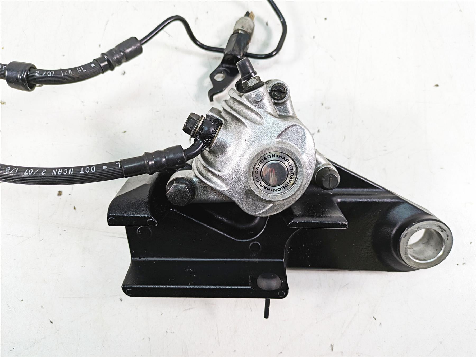 2007 Harley Sportster XL1200 C Rear Brake Caliper + Bracket & Line 42029-07 {{ shop.shopifyCountryName }} - Mototech271