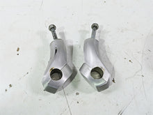 Load image into Gallery viewer, 2004 Victory Kingpin Handlebar Riser Holder Set 1821325 1821325
