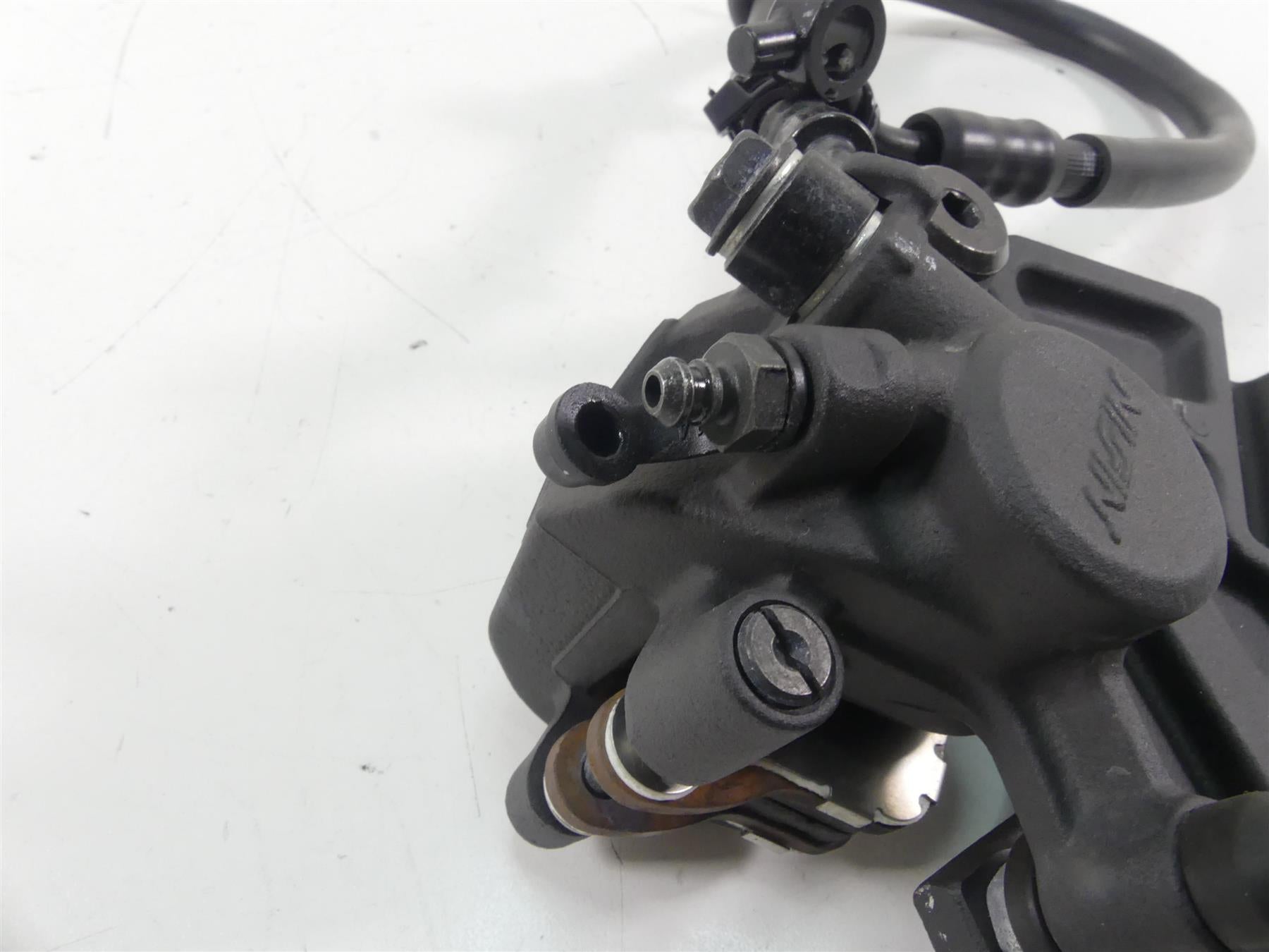 2013 Kawasaki ZX636 ZX6R Ninja Nissin Rear Brake Caliper + Mount 43080-0114-DJ {{ shop.shopifyCountryName }} - Mototech271