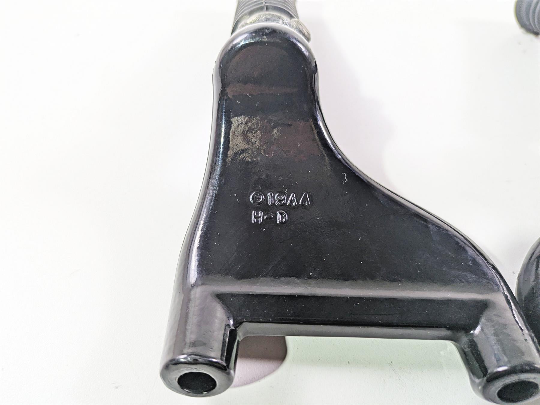 2007 Harley Sportster XL1200 C Rear Passenger Foot Peg Set 49314-04 49315-04 {{ shop.shopifyCountryName }} - Mototech271
