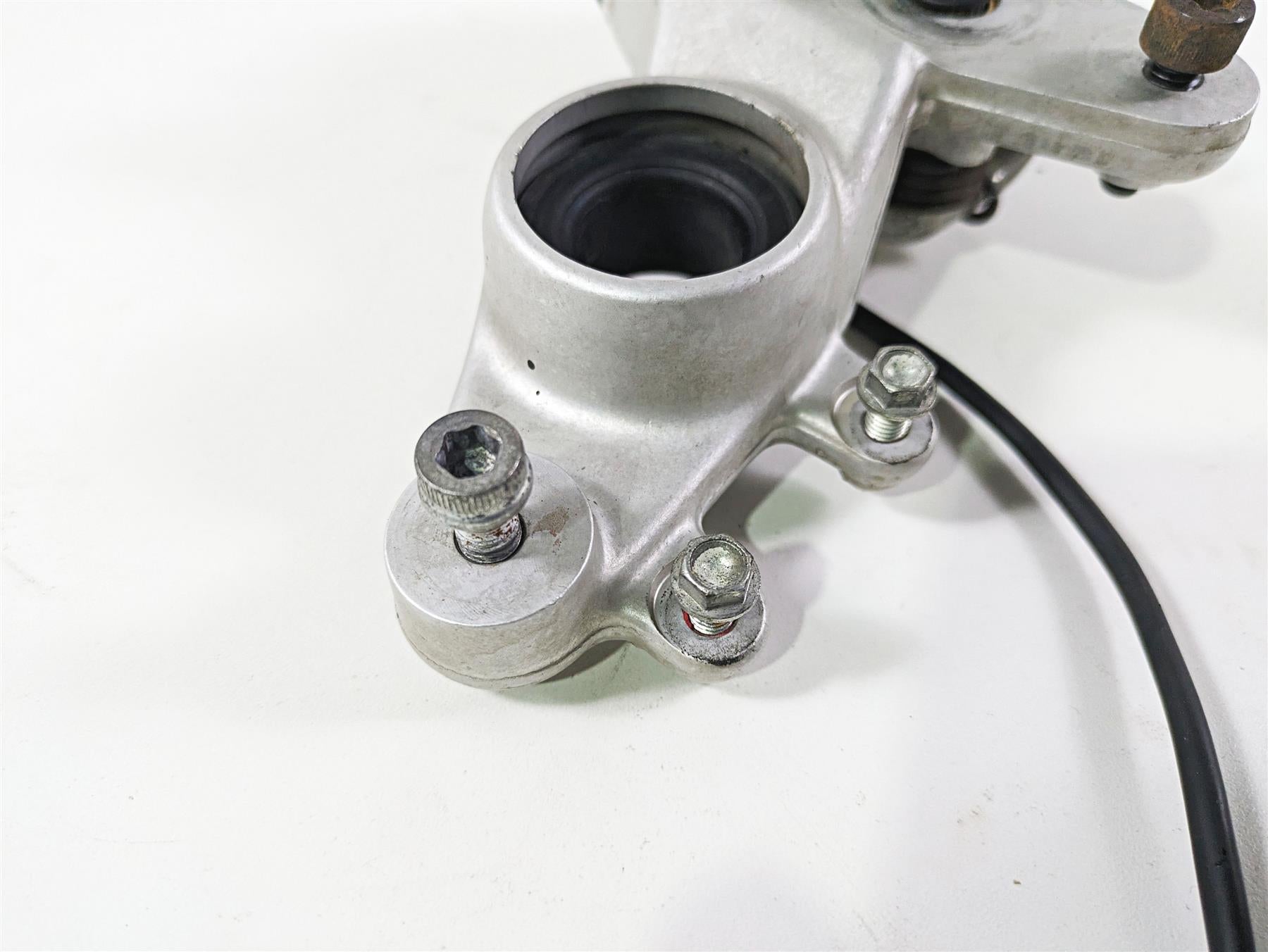 2009 Ducati Multistrada 1100 S Front Right Footpeg Brake Mount Bracket 82420711A {{ shop.shopifyCountryName }} - Mototech271