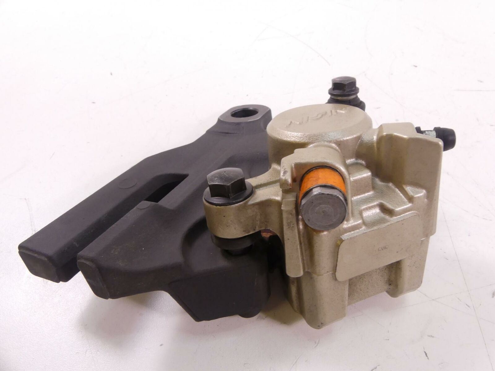 2014 Triumph Tiger 800 ABS Rear Nissin Brake Caliper With Bracket T2025050 {{ shop.shopifyCountryName }} - Mototech271