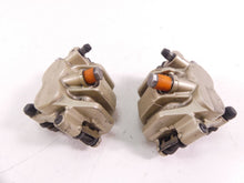 Load image into Gallery viewer, 2014 Triumph Tiger 800 ABS Front Nissin Brake Caliper Set T2022030 T2022031
