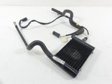 Load image into Gallery viewer, 2014 Harley Touring FLHTK Electra Glide Left Coolant Radiator  26800006 | Mototech271
