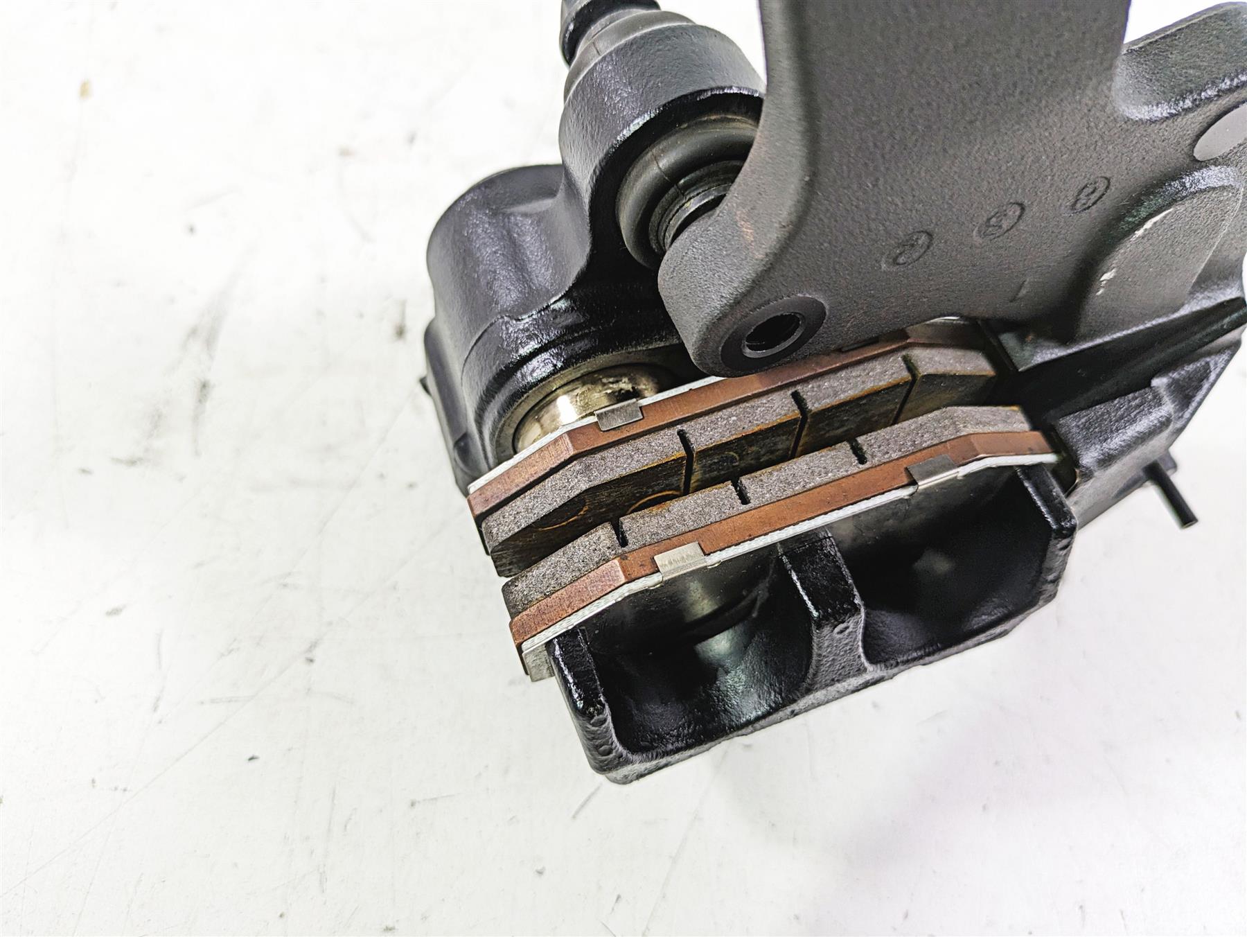 2019 Harley FLHCS Softail Heritage Rear Brake Caliper & Bracket 41300192 {{ shop.shopifyCountryName }} - Mototech271