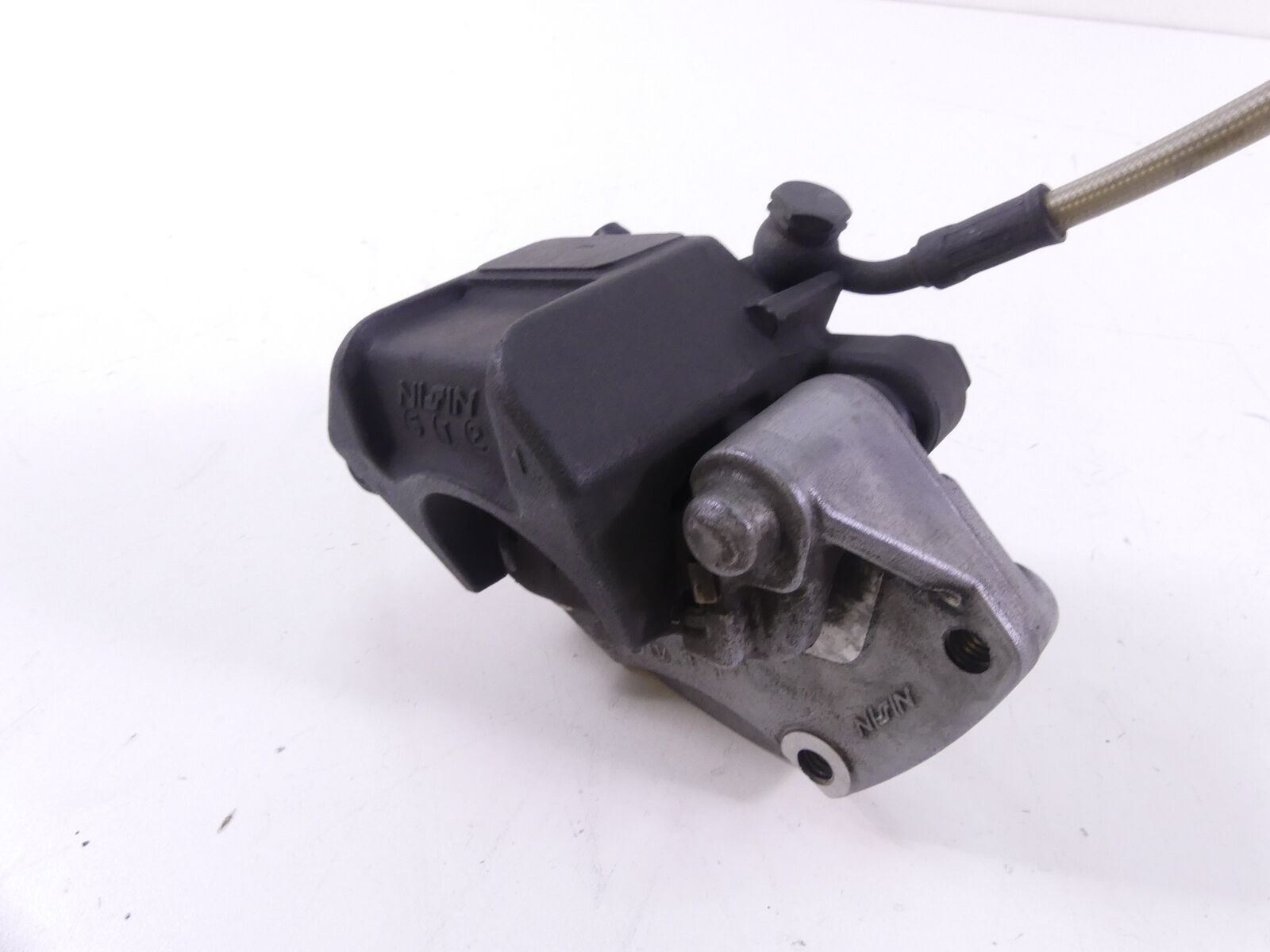 2006 Buell Ulysses XB12 X Rear Nissin Brake Caliper & Bracket H0102.02A8A {{ shop.shopifyCountryName }} - Mototech271