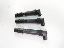 Load image into Gallery viewer, 2012 Triumph Tiger 800XC ABS Denso Ignition Coils Stick Coil Set T1291502

