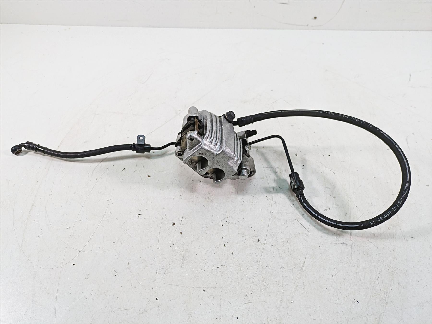 2007 Harley Sportster XL1200 C Front Brake Caliper + Line 44121-07A {{ shop.shopifyCountryName }} - Mototech271