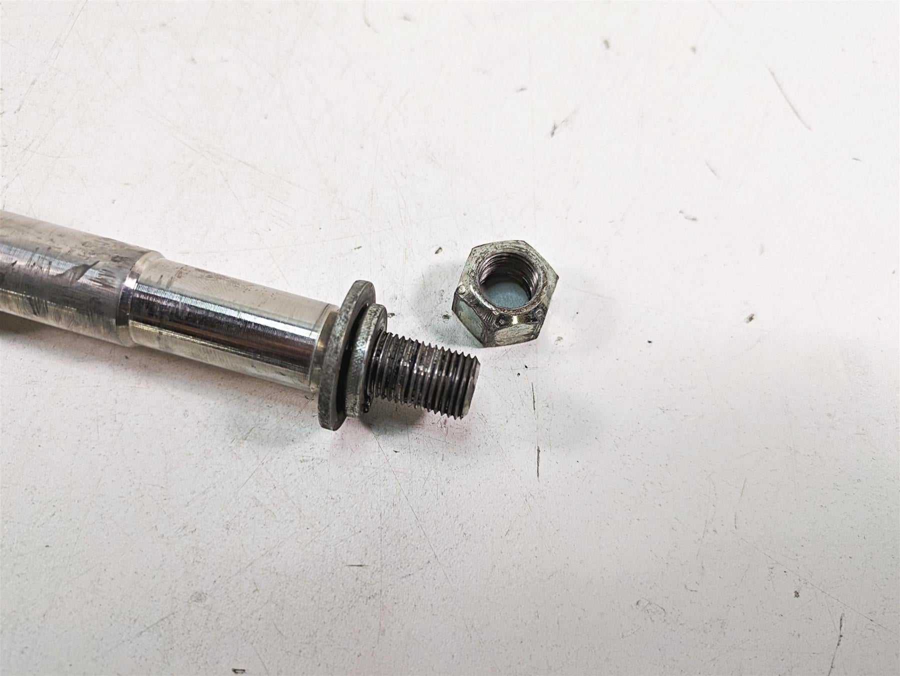 2006 Harley FLSTI Softail Heritage Front Axle Wheel Spindle 3/4" 41584-86A {{ shop.shopifyCountryName }} - Mototech271