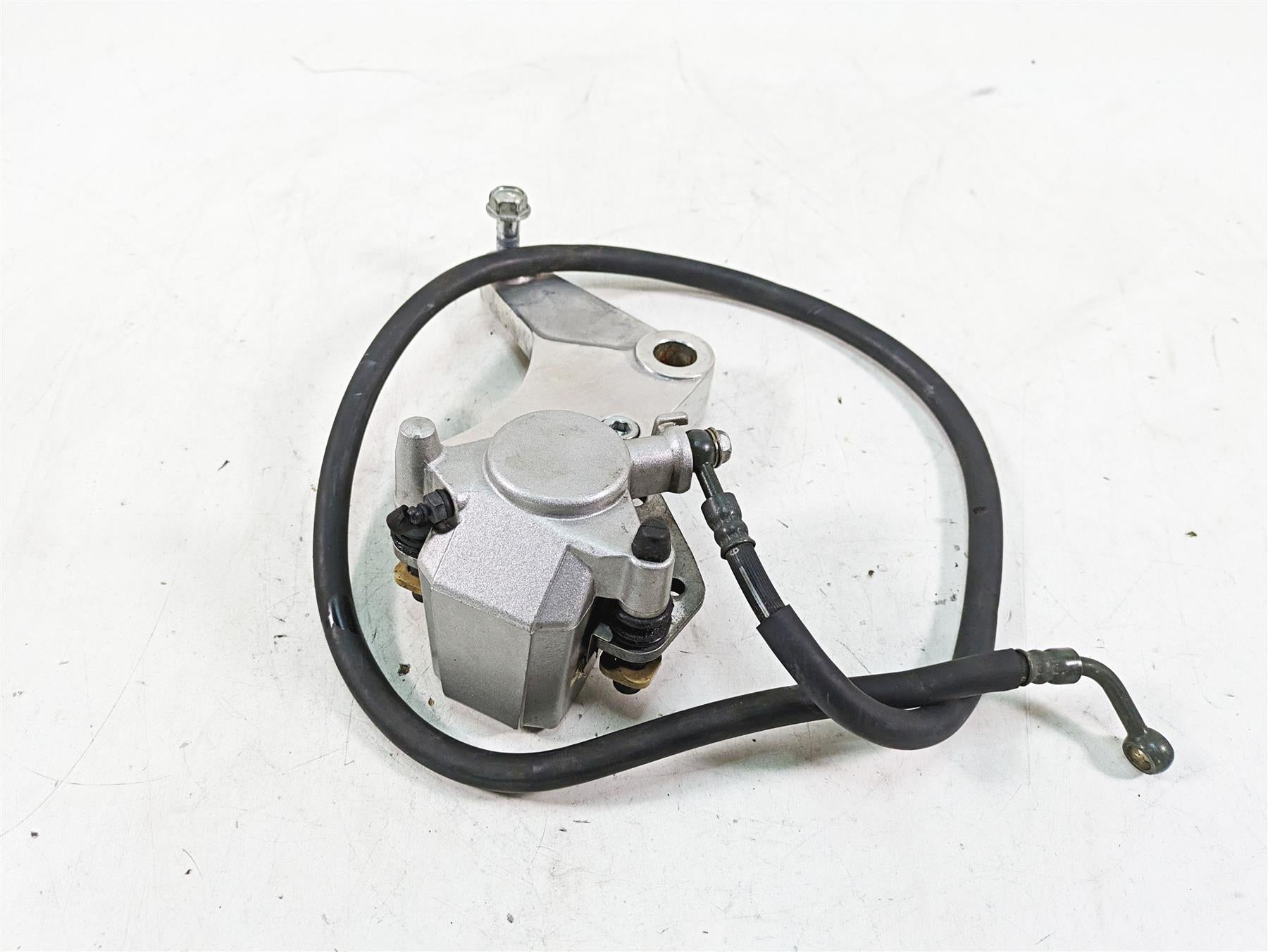 1997 Kawasaki VN1500 Vulcan Tokico Rear Brake Caliper & Bracket 43041-1588-GN {{ shop.shopifyCountryName }} - Mototech271