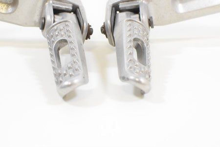 2005 Honda CBR1000RR CBR1000 RR Rear Passenger Footpeg SET 50750-MEL-000 {{ shop.shopifyCountryName }} - Mototech271