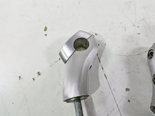 Load image into Gallery viewer, 2004 Victory Kingpin Handlebar Riser Holder Set 1821325 1821325
